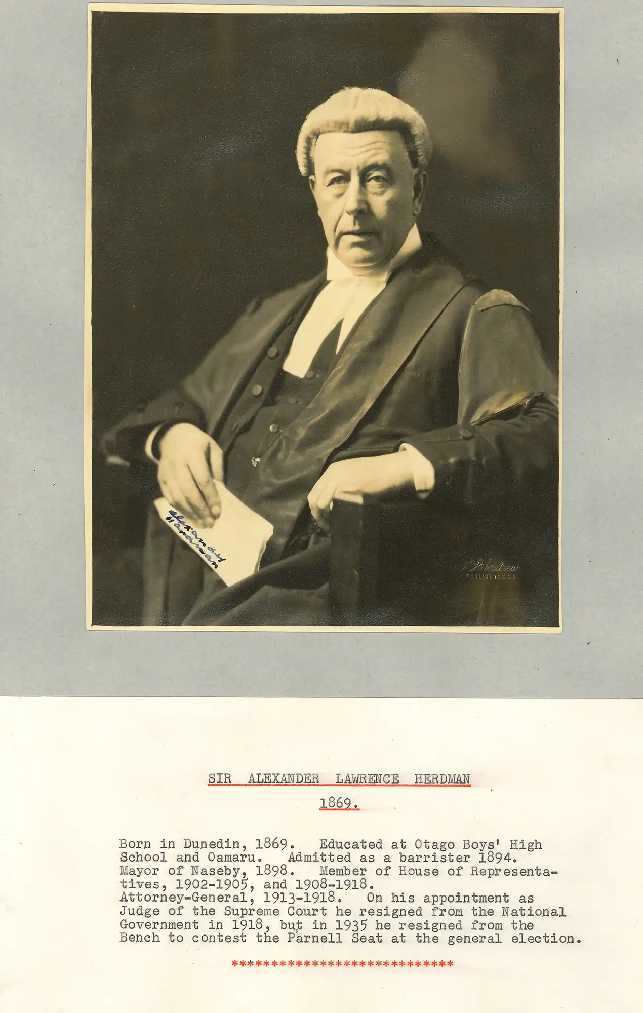 The Honourable Sir Alexander Lawrence Herdman (1869-1953). Portrait photograph and brief typed biography.