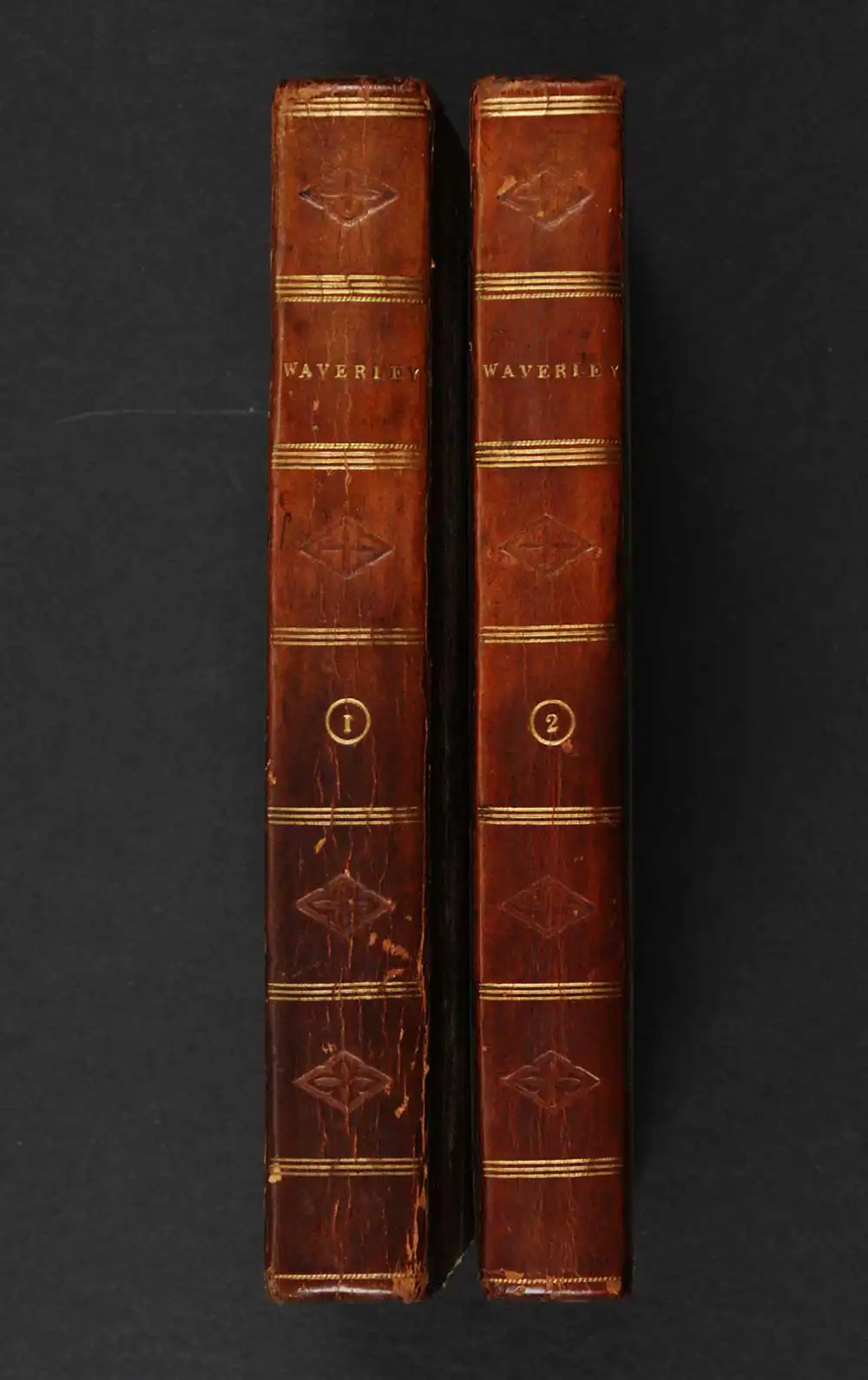 [Sir Walter Scott]. <em>Waverley, or, ‘Tis sixty years since.</em> [1st edition]. Edinburgh: Printed by James Ballantyne and Co. for Archibald Constable and Co., Edinburgh; and Longman, Hurst, Rees, Orme, and Brown, London, 1814. Three volumes; Vol. 1, 2 displayed.
