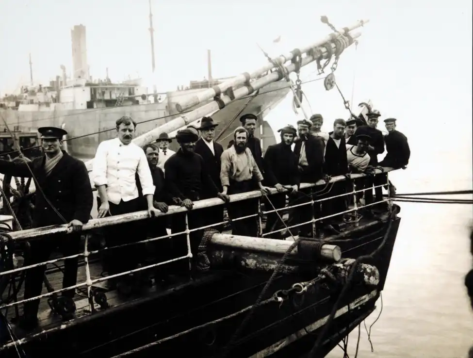 Photograph (copy). The crew aboard the <i>Aurora</i> while in Port Chalmers, 1916.