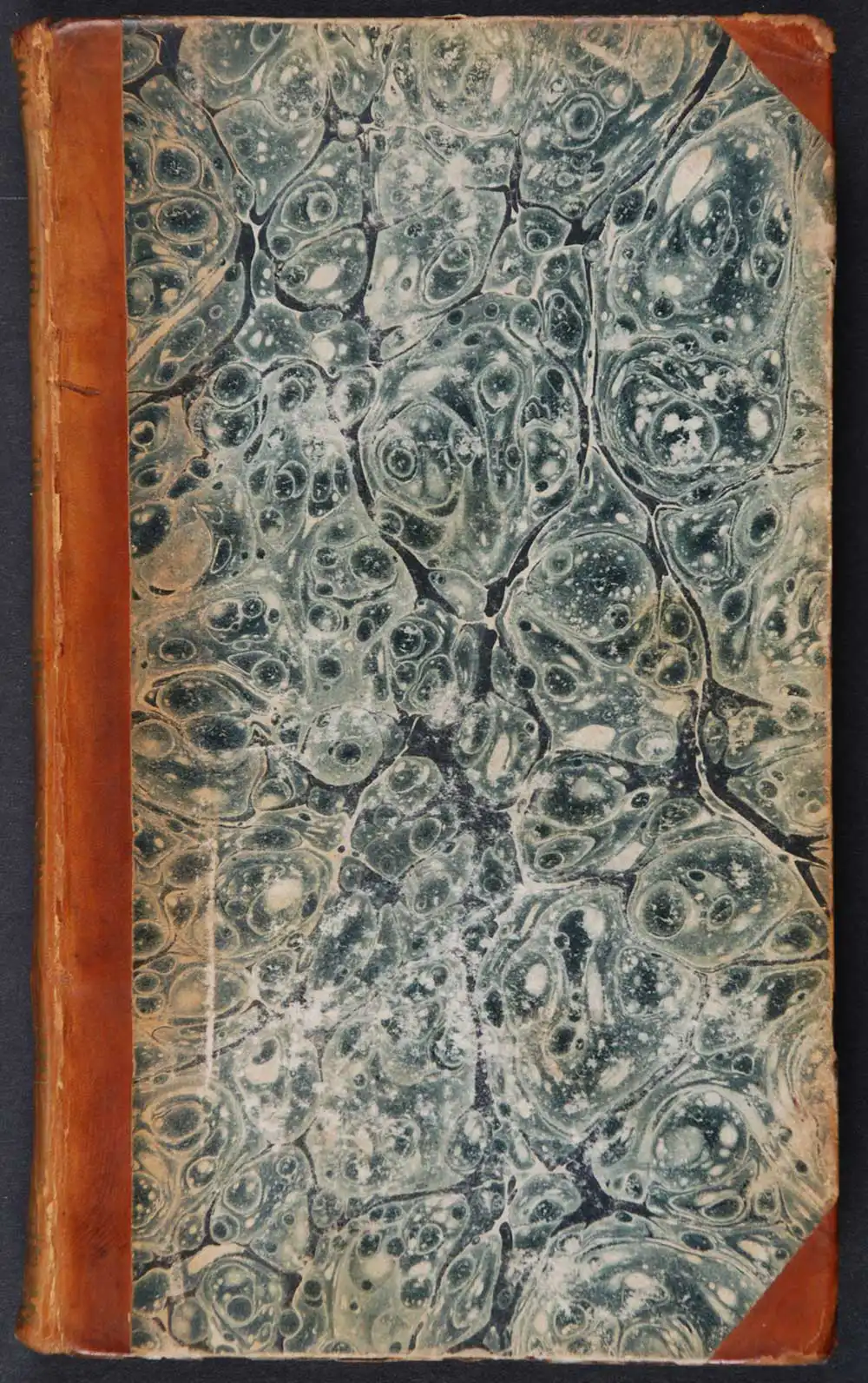 [Sir Walter Scott]. <em>Guy Mannering, or, The astrologer.</em> [1st edition]. Edinburgh: Printed by James Ballantyne and Co. for Longman, Hurst, Rees, Orme, and Brown, London; and Archibald Constable and Co., Edinburgh, 1815. Three volumes; Vol. 2 displayed.
