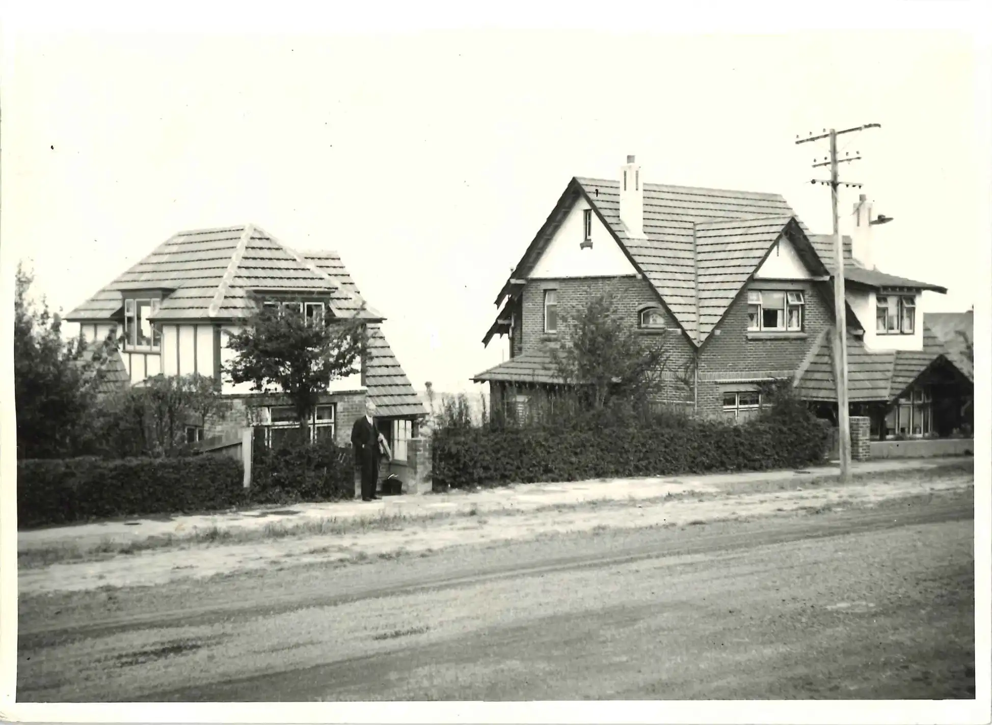 Photographic view of 153 (with A.H. Reed outside) and 155 Glenpark Avenue, Mornington, 1950s.