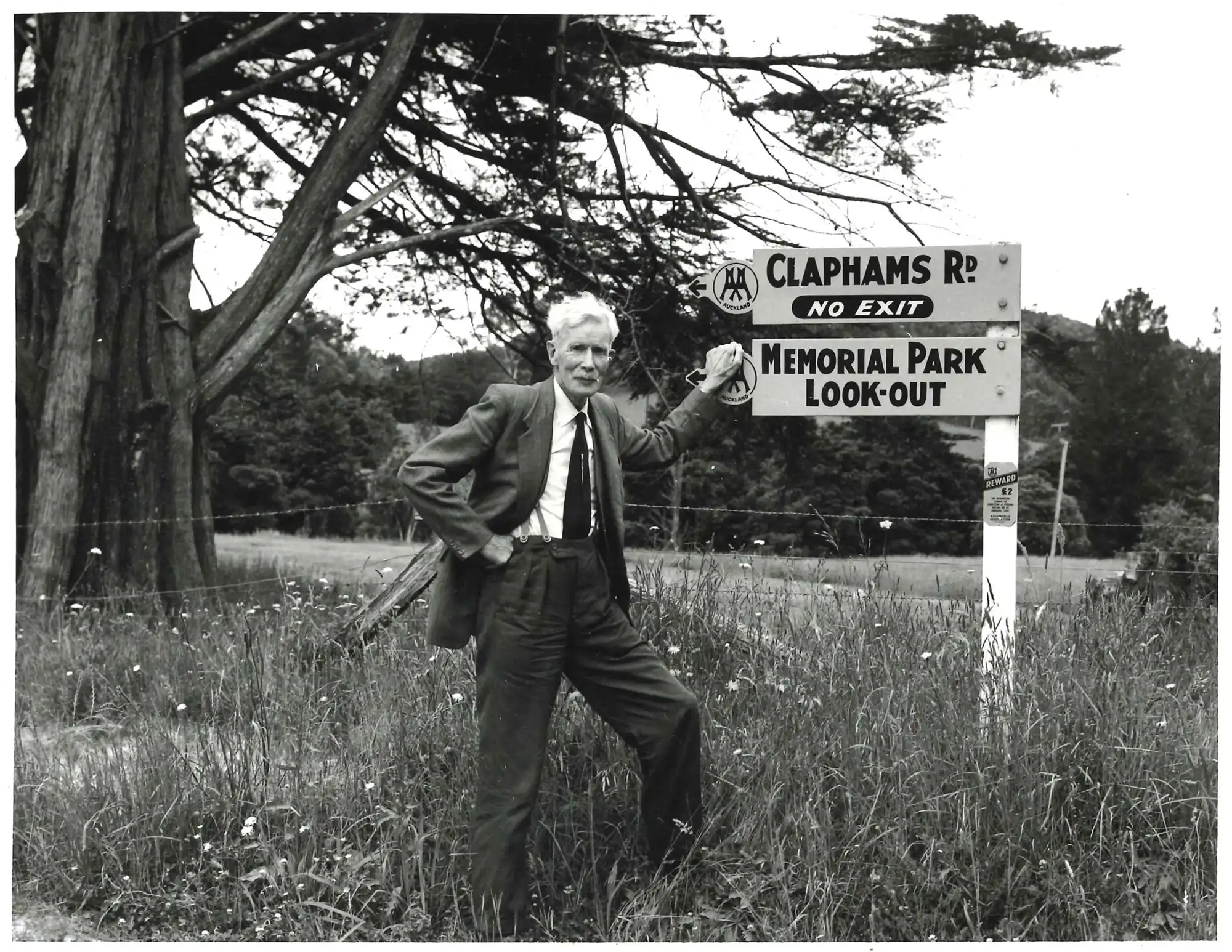 Photograph of A.H. Reed outside the memorial kauri park, 1960s. Photograph by Tudor Collins.