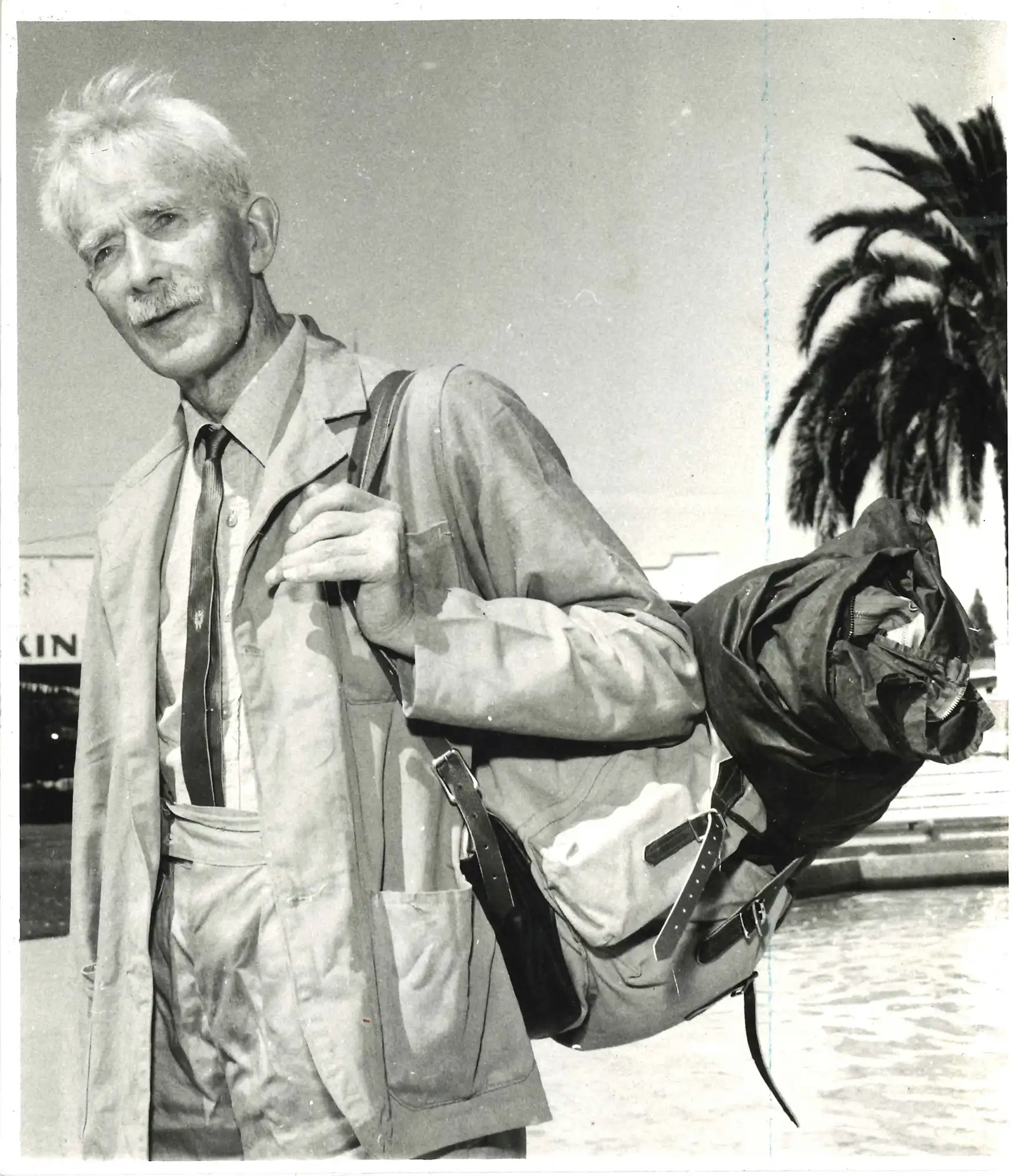 Photograph of A.H. Reed with backpack on Marlborough journey walk (Marlborough Express)