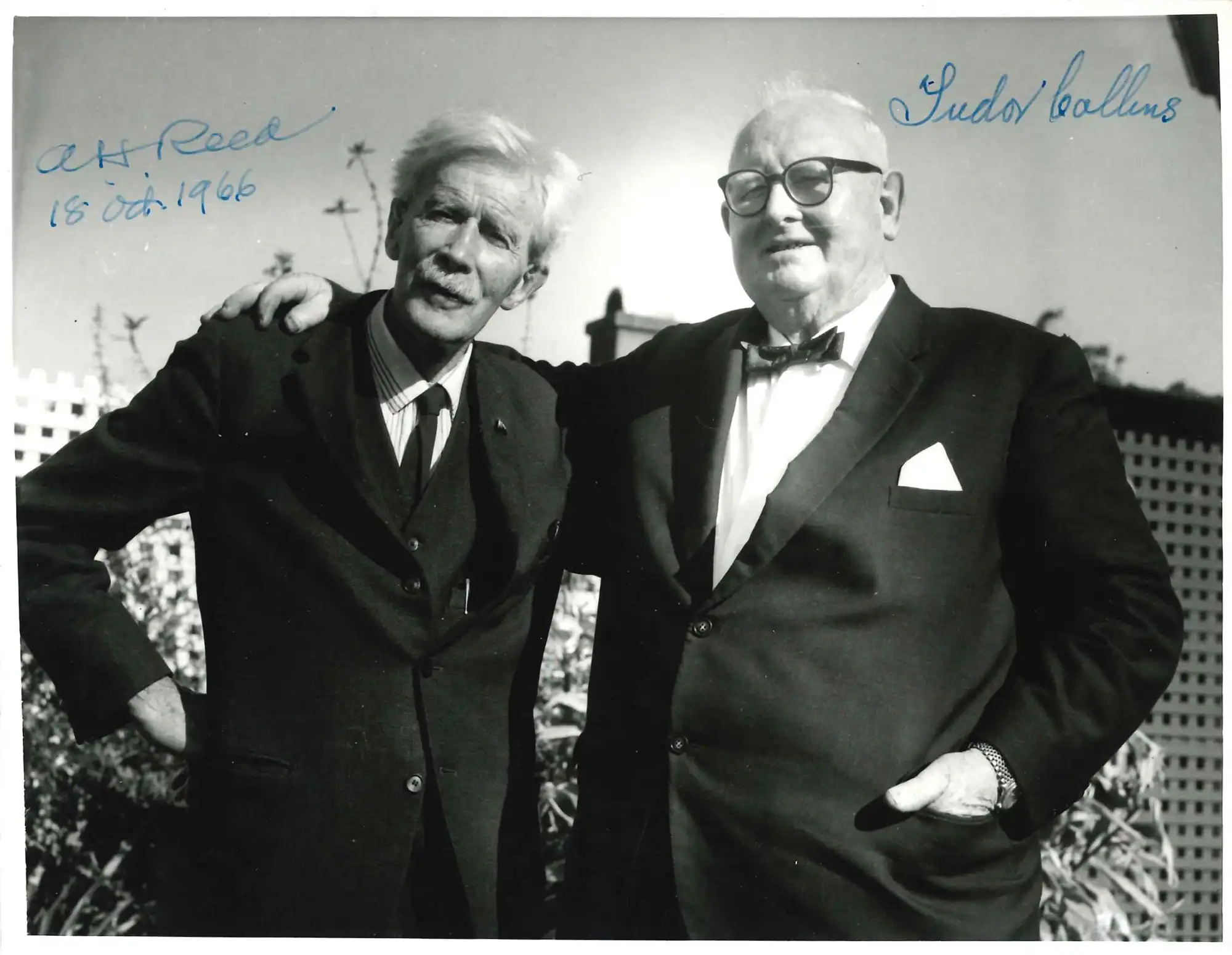 Photograph of A.H. Reed and Tudor Collins, signed by both, 1966.